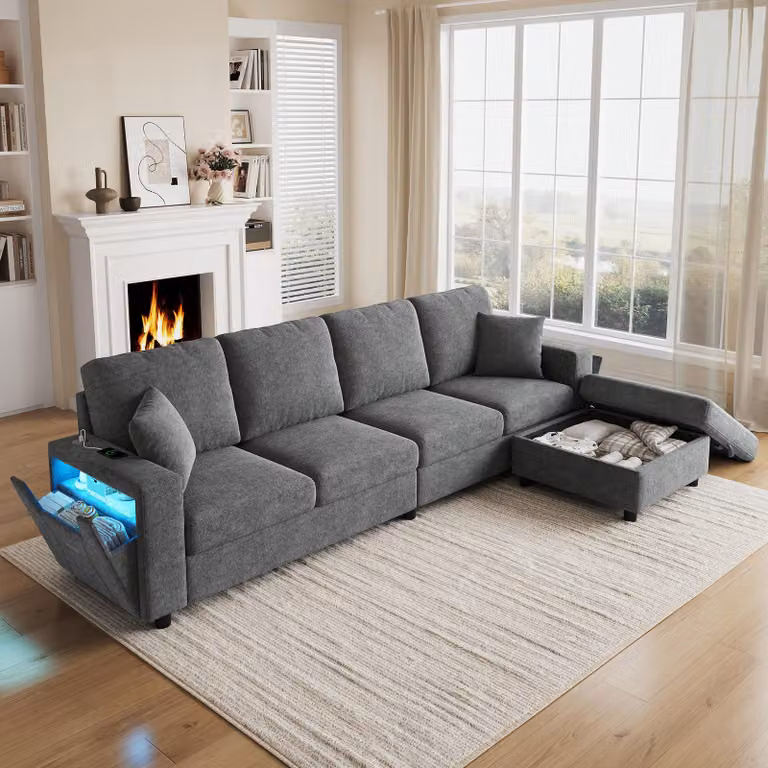 Divano angolare Flieks con illuminazione a LED e prese USB, divano a 4 posti con poggiapiedi e braccioli contenitori, dimensioni 282x153x82 cm, colore grigio, materiale: poliestere