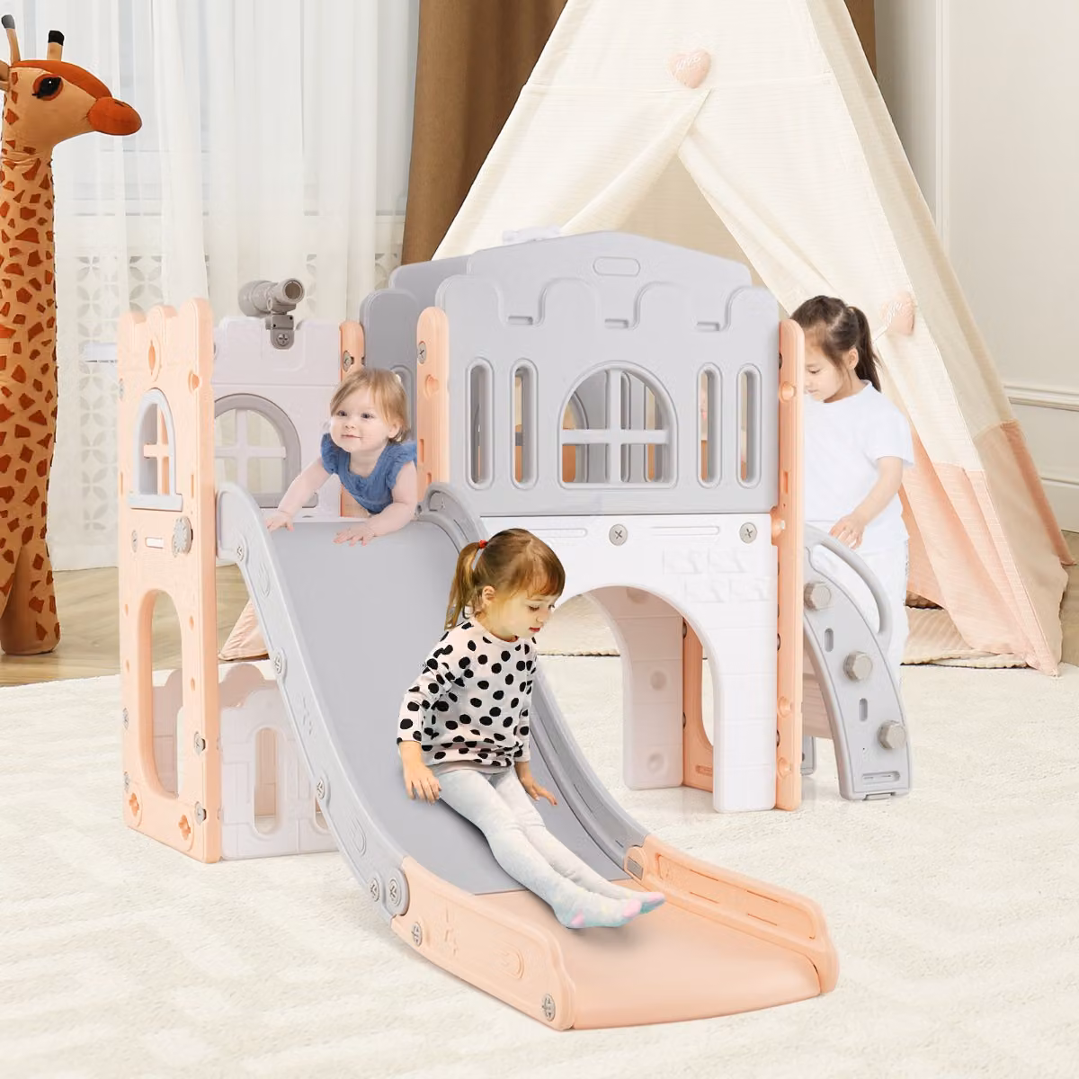 Scivolo per bambini 9 in 1 Costway con canestro da basket e spazio di archiviazione, scivolo da interno in plastica per bambini dai 12 mesi in grigio e rosa