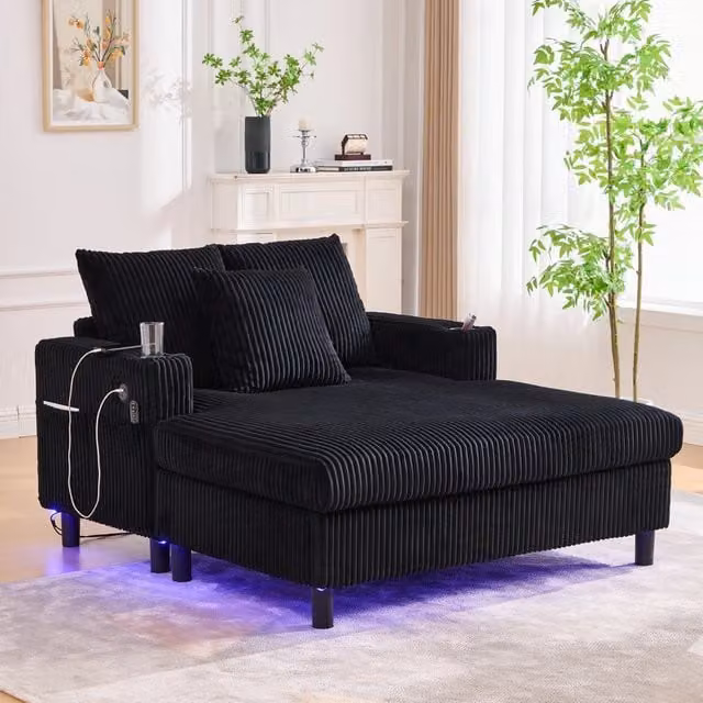 Poltrona oversize MIVRAY in velluto a coste nero con LED multicolore, porte USB, portabevande e tre cuscini