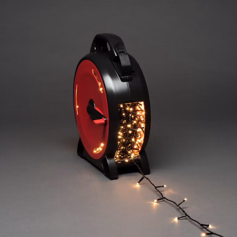 Konstsmide Micro LED con avvolgicavo, 800 diodi bianco caldo, 30V, per esterni (IP44), cavo nero morbido - 3838-107