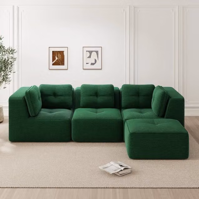 Divano angolare modulare in velluto a coste verde con braccioli larghi