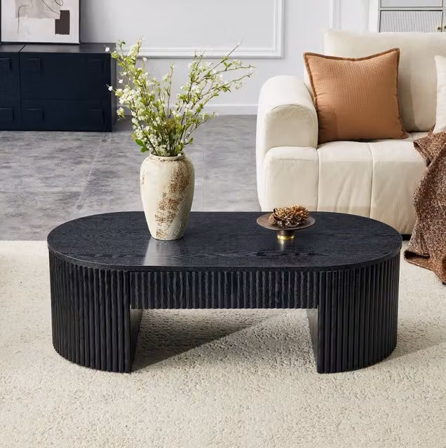 Tavolino basso ovale nero in MDF con cassetto estraibile e scanalature laterali