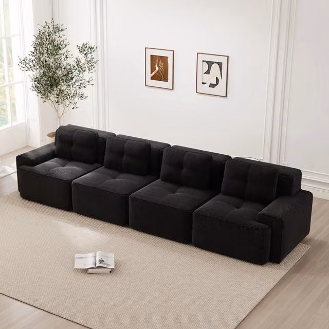Divano modulare a L MIVRAY in velluto a coste nero con seduta profonda 74 cm e braccioli extra larghi