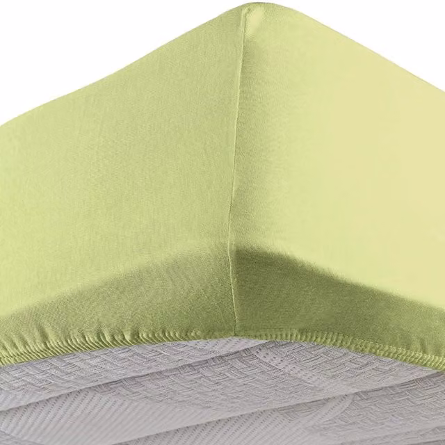 Lenzuolo con angoli elastici DaunenStep in jersey multicolore e verde con certificazione Oeko-Tex Standard 100