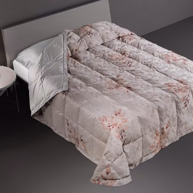 Trapunta in piuma DaunenStep con fantasia floreale multicolore, traspirante e termoregolatrice per inverno