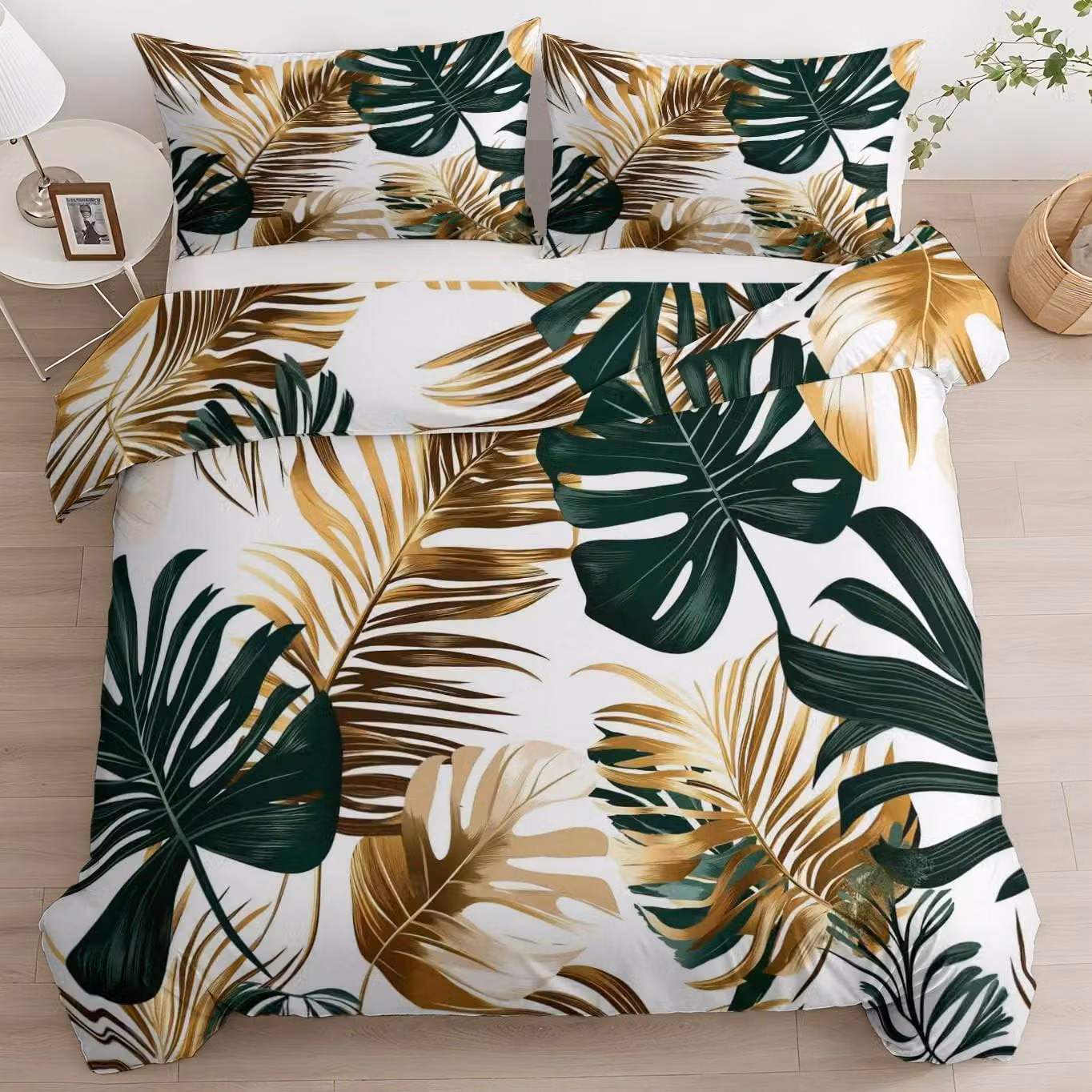 Copripiumino color oro con motivi di foglie tropicali