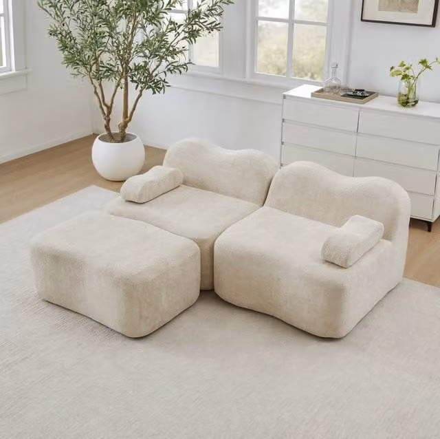 Divano angolare modulare senza telaio in velluto beige con pouf collegabile