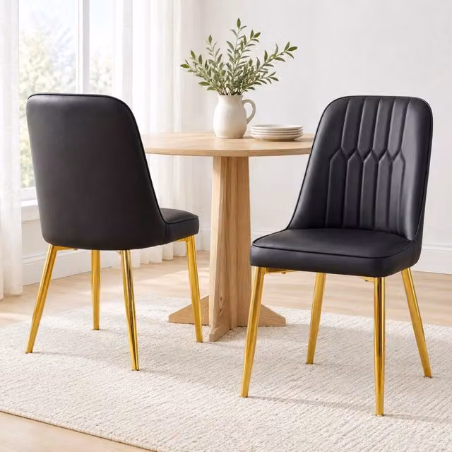 Sedia da pranzo ULEVR nera e oro con seduta imbottita in similpelle e gambe in metallo