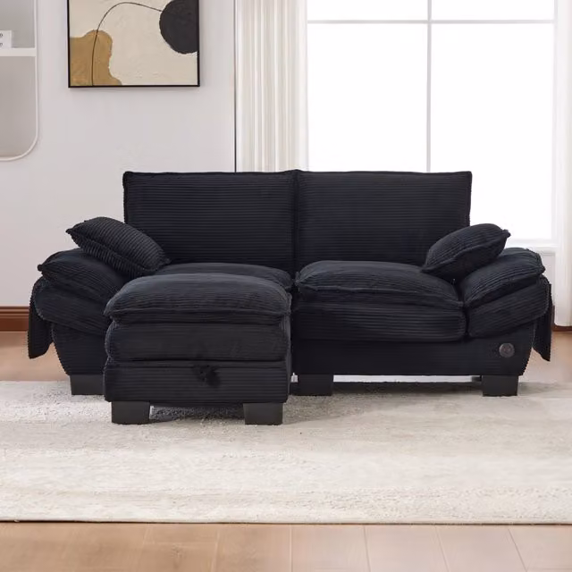 Divano a 2 posti REDOM in velluto a coste nero con pouf coordinato e ricarica USB L: 190 cm, P: 132 cm, H: 84 cm