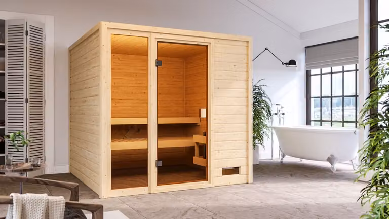 Sauna Woodfeeling Jutta (ingresso frontale), porta interamente in vetro, colore bronzo, riscaldatore 9 kW centralina integrata