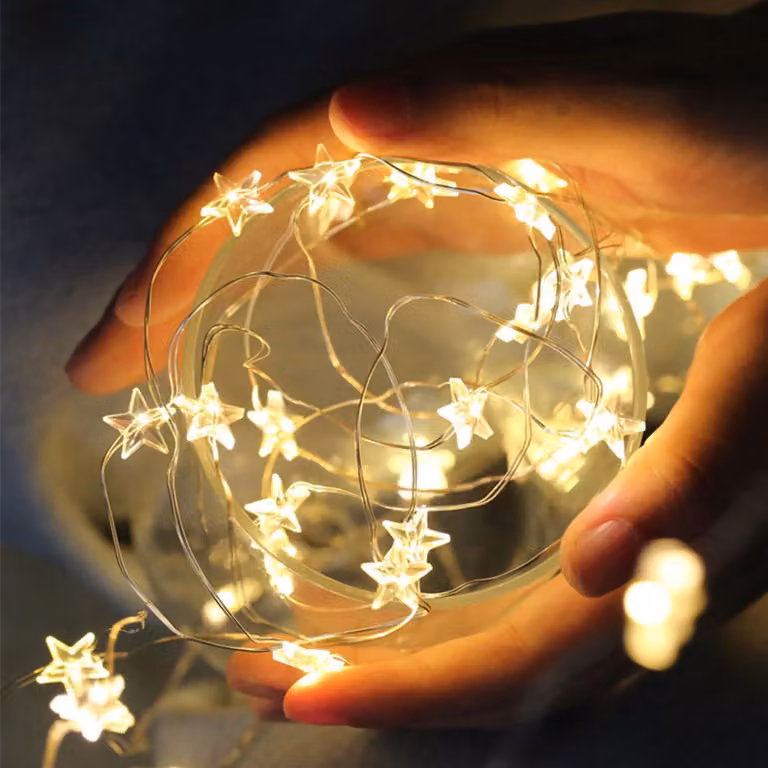 Catena luminosa a LED a forma di stelle, 2 metri, 20 LED bianco caldo, alimentata a batteria