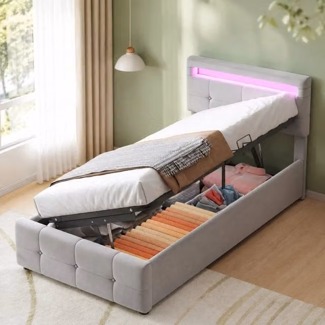 Letto singolo imbottito MODFU in velluto grigio con contenitore idraulico, illuminazione LED sottostante e testiera regolabile, L/P/H: 90 x 200 x 105 cm