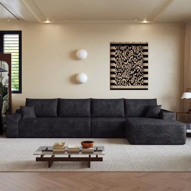 Divano angolare modulare Vovees Living a 4 posti in velluto a coste nero con chaiselongue, Larghezza: 340 cm