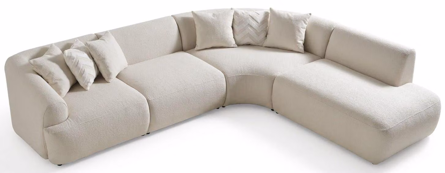Divano ad angolo a forma di "L", design curvo, rivestito in tessuto beige, ideale per il soggiorno, confortevole
