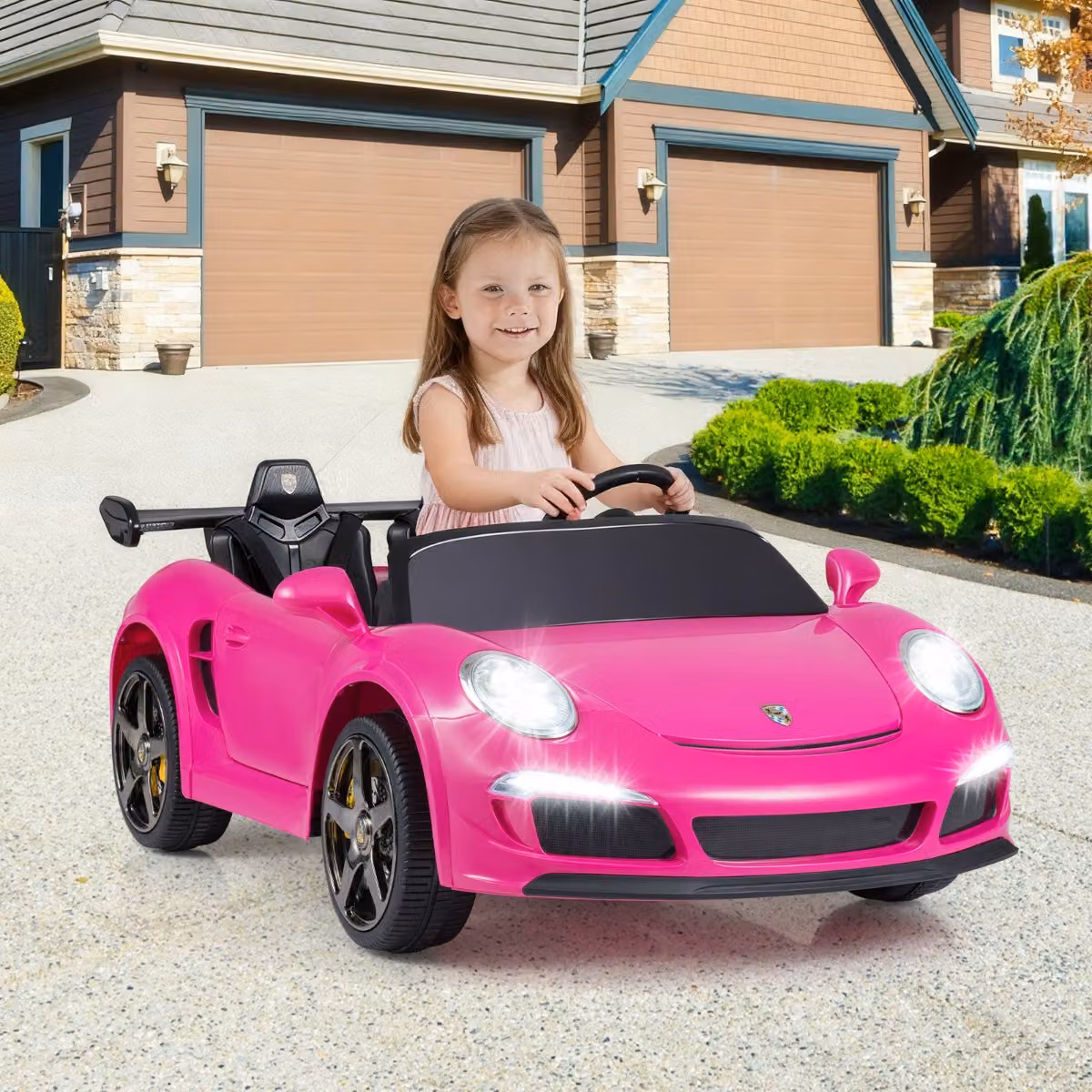 Auto elettrica a pedali Costway per bambini con telecomando per genitori, luci e clacson, Rosa