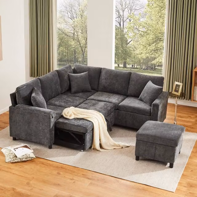 Divano letto angolare Mivray in ciniglia grigio con funzione letto, pouf contenitore, ricarica USB, lampada e tavolini L/P/H: 205 x 205 x 85 cm