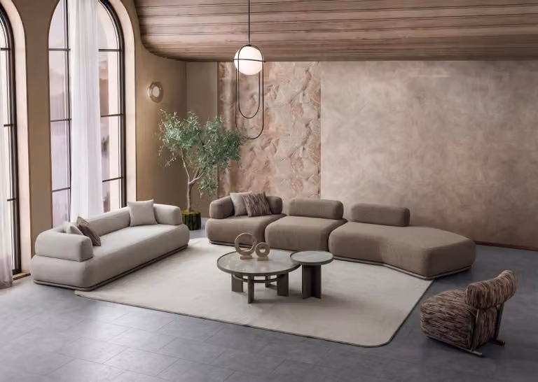 Divano angolare modulare beige, rivestito in tessuto, dal design moderno e confortevole, ideale per il relax
