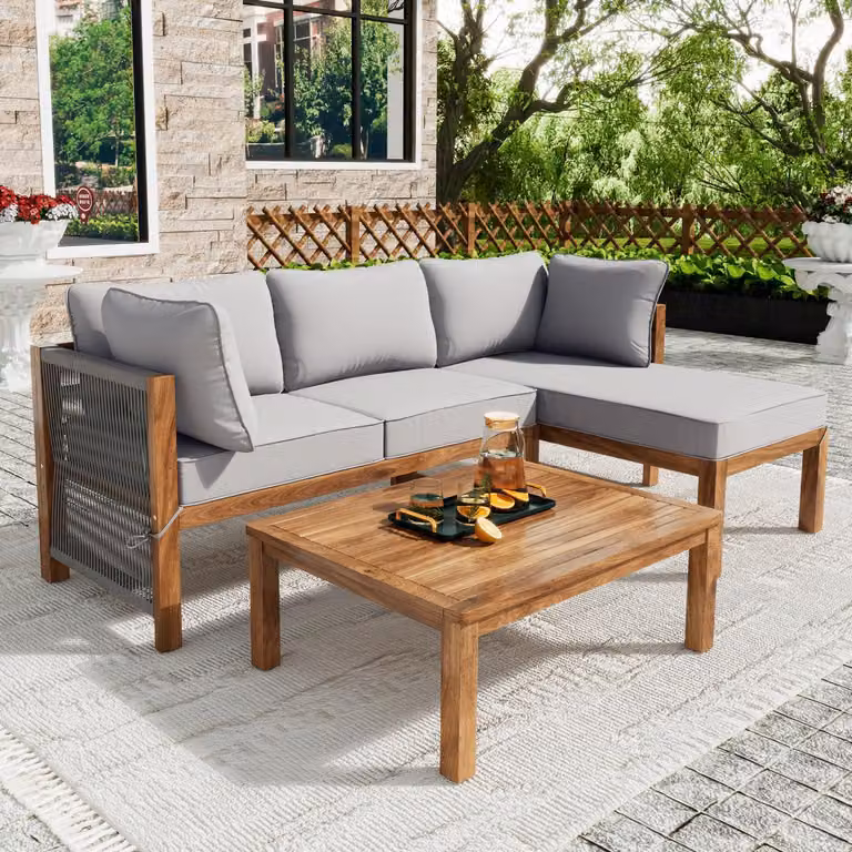 Set da salotto per giardino, composto da 3 pezzi, in legno di acacia con intreccio di corde e cuscini grigi. Arredamento da giardino
