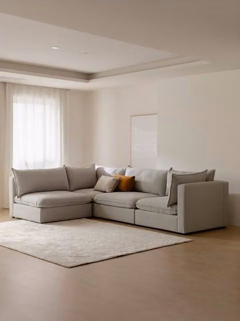 Dean divano modulare reversibile beige Kenay Home con forma a L e cuscini coordinati