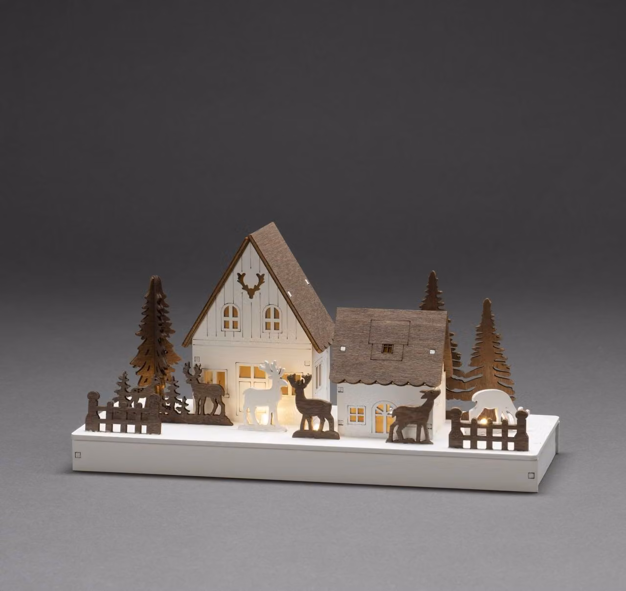 Sagoma in legno a LED "Case nella foresta con renne" 3282-210