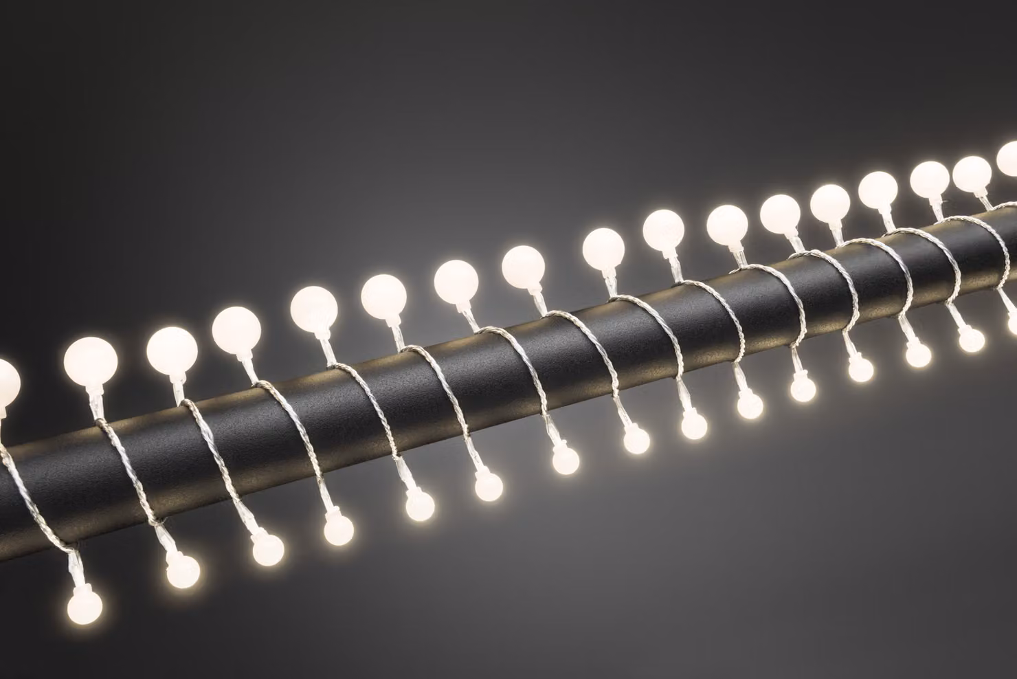 Konstsmide - Globelichterkette a LED, diodi rotondi piccoli e grandi, 80 diodi bianco caldo, trasformatore per esterni da 24 V, cavo trasparente; 3680-103