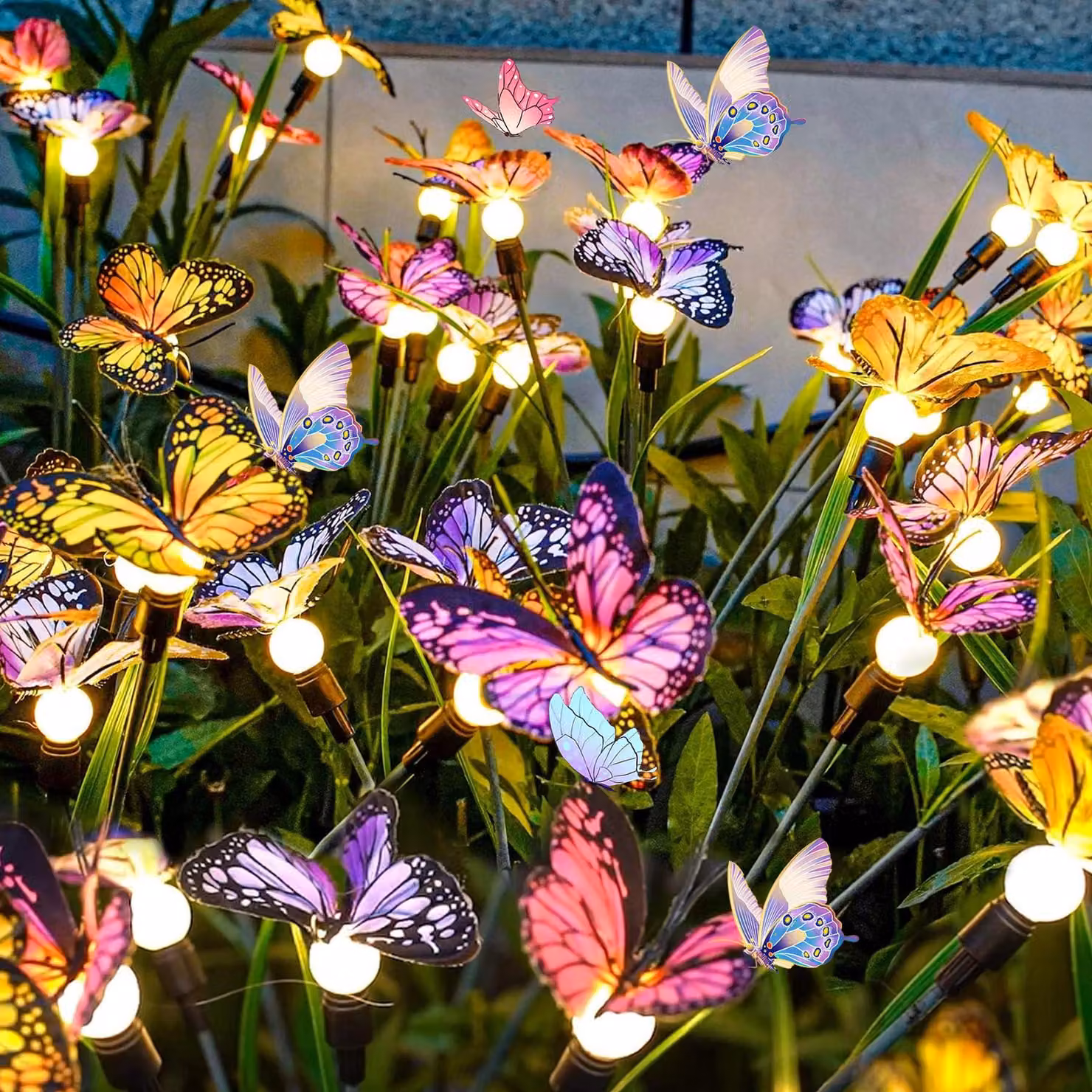 Set di 2 luci solari a forma di farfalla, con 12 LED, impermeabili, per decorazioni da esterno