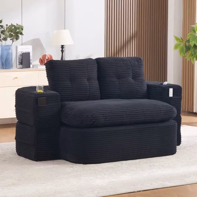 Poltrona relax modulare MIVRAY in velluto a coste nero con pouf estensibile e braccioli