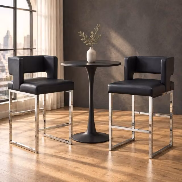 Sgabello da bar nordico con seduta imbottita in PU nero e gambe in metallo argento; H 91;4 cm