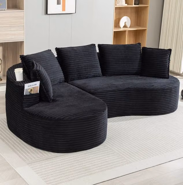 Divano curvo ULEVR 250x152x82 cm in velluto a coste nero con portabevande e tasche laterali