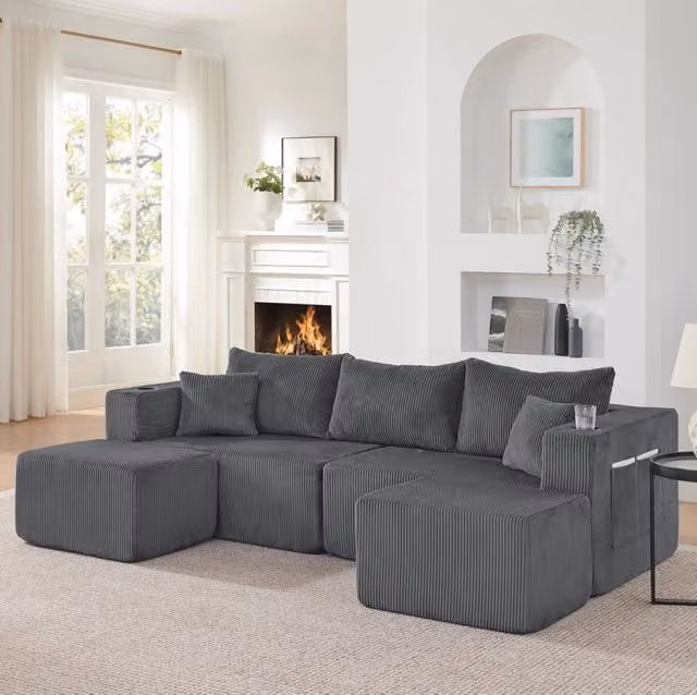 Divano angolare modulare 3 posti con 2 pouf mobili; portabicchieri e tasche laterali; velluto a coste grigio