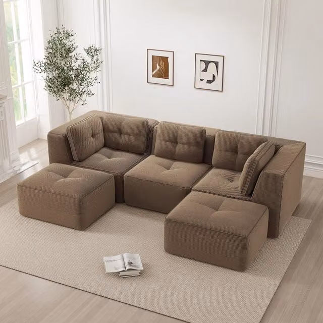 Divano angolare modulare senza struttura con seduta profonda e comfort avvolgente in velluto a coste marrone