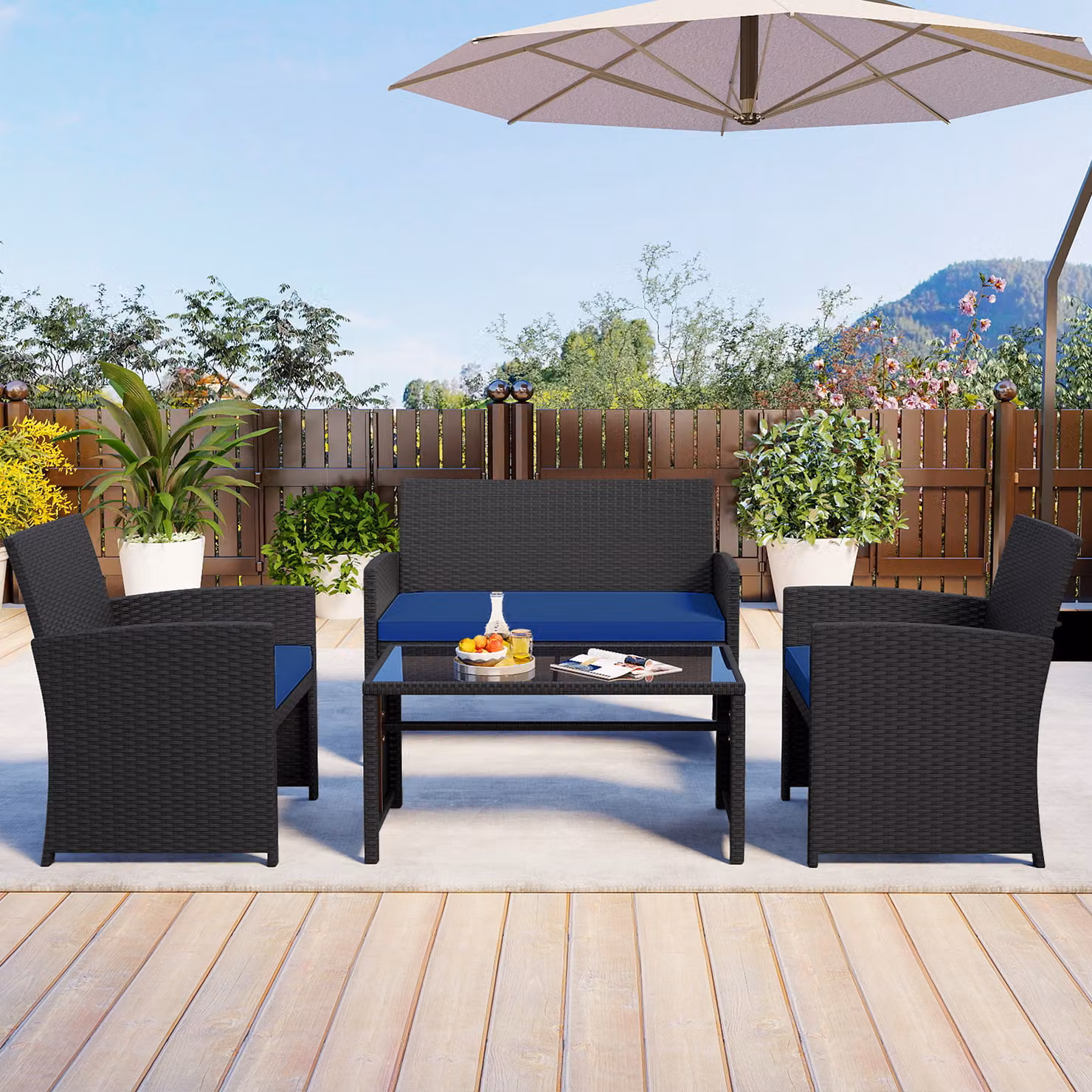 Set da salotto da esterno Costway in rattan blu navy composto da 4 pezzi con divanetto a 2 posti, poltrone e tavolino con piano in vetro temperato