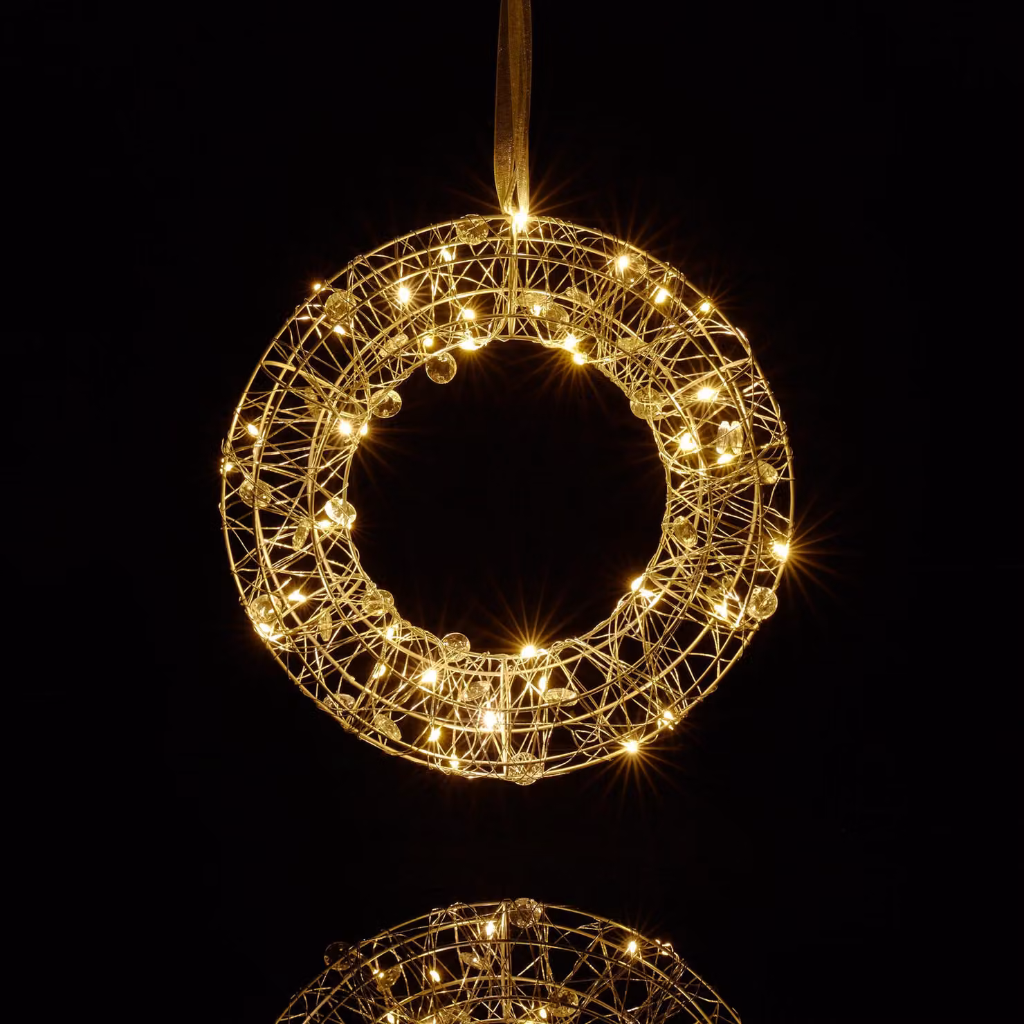 Ghirlanda luminosa a LED, diametro 25 cm, color argento, con luci LED bianco caldo, alimentata a batteria