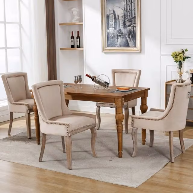Sedia da pranzo imbottita in velluto beige con struttura in legno massello