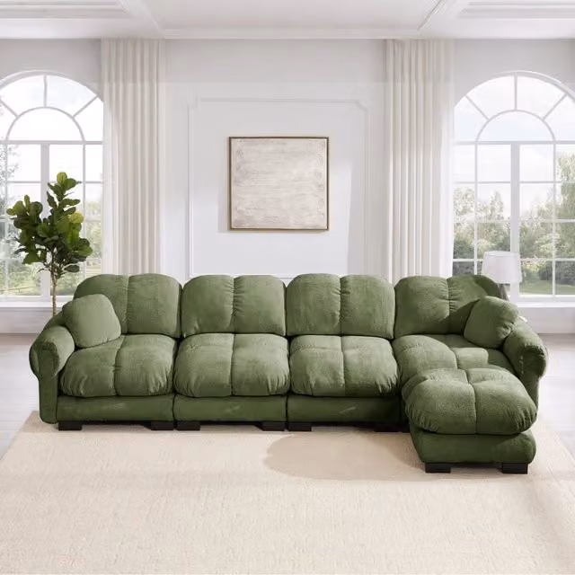 Divano angolare a 4 posti Mivray in velluto verde con ottomana coordinata e cuscini, design moderno a L con orientamento destro, L/P/H: 330 x 149 x 97 cm