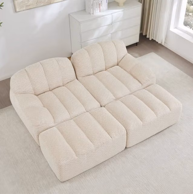 Divano modulare senza struttura rigida in pile granulato beige bianco con ottoman