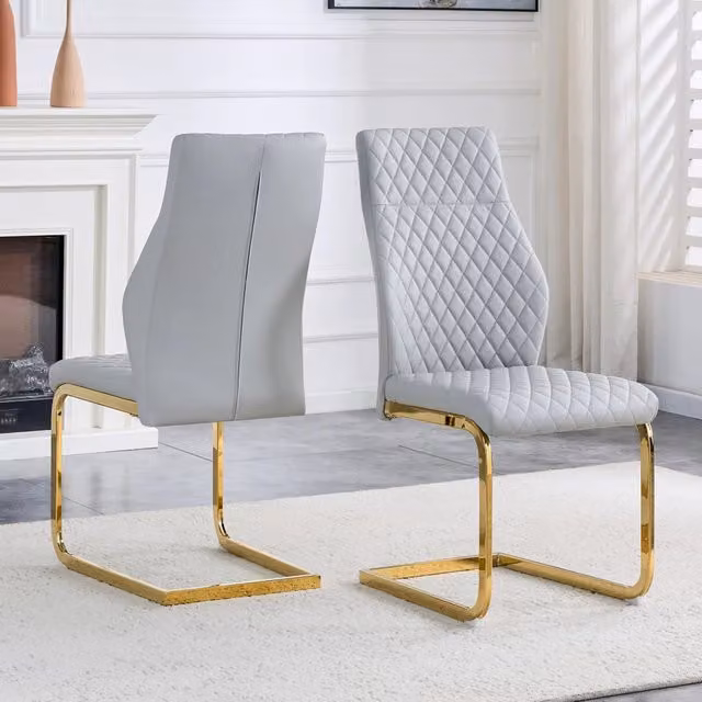 Set di 2 sedie da pranzo Zephmum con schienale alto, rivestimento in ecopelle grigia con motivo geometrico e struttura metallica dorata lucida