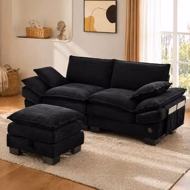 Divano 2 posti con pouf in corduroy nero; USB-C; tasche laterali e vano contenitore 190x132x84 cm