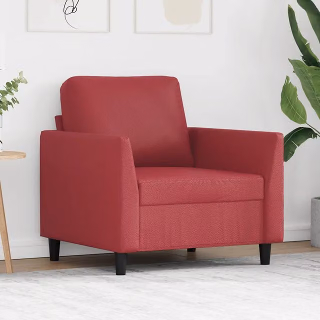 Poltrona moderna in similpelle rosso vino con struttura in metallo e braccioli