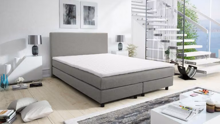 Letto con rete a molle Boxspring, modello Glenn, 1 piazza, dimensioni 140x200 cm, con molle Bonell. Include un topper (materasso aggiuntivo) di colore grigio chiaro