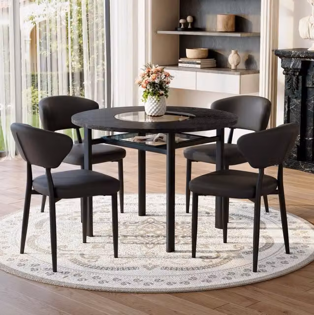 Set tavolo rotondo con 4 sedie nere in PU