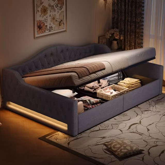 Divano letto MODFU con contenitore e illuminazione LED in tessuto grigio, L/P: 140 x 200 cm