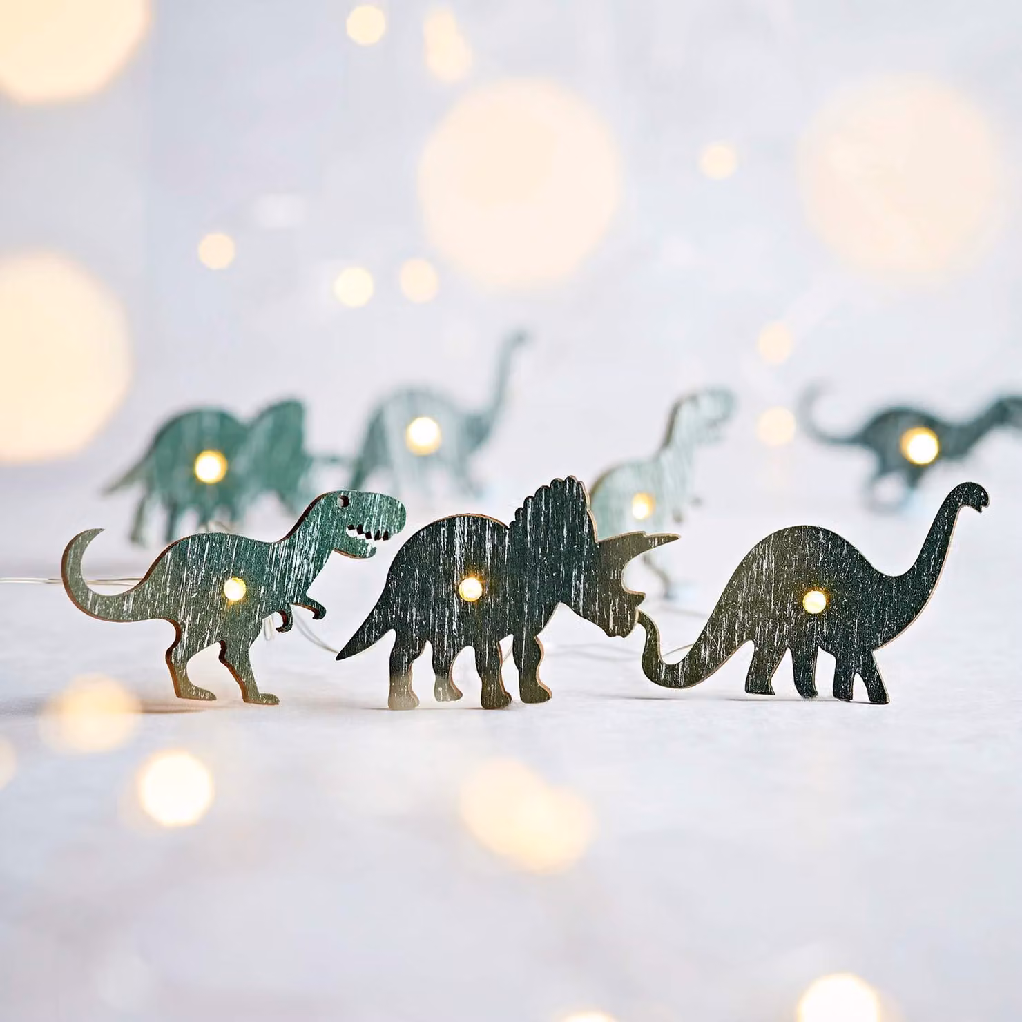 Catena luminosa a tema dinosauri, con 20 LED bianco caldo, timer integrato, lunghezza 1,9 metri