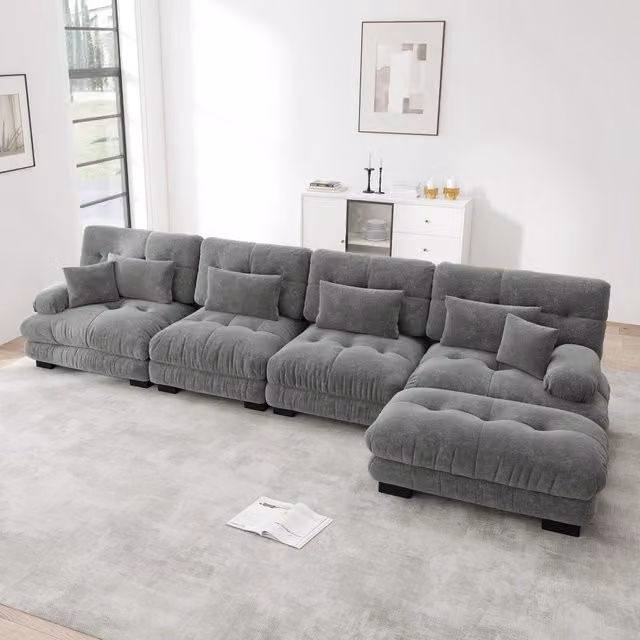 Divano angolare modulare OKWISH a 4 posti con ottomani e cuscini decorativi, design moderno effetto cloud in tessuto grigio