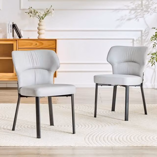 Set di 2 sedie da pranzo OKWISH in ecopelle grigia con struttura in metallo nero e seduta imbottita