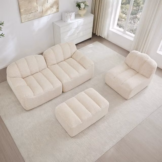 Divano angolare modulare MIVRAY in tessuto bouclé beige e bianco con pouf coordinato, design moderno e reversibile per il tuo soggiorno