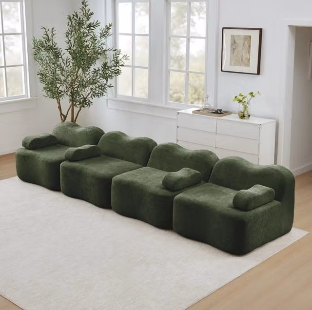 Divano modulare ad angolo in velluto verde 384x98x70 cm con seduta profonda e pouf collegabile
