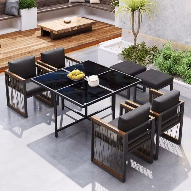Set da giardino da pranzo 7 pezzi per 6 persone con tavolo in vetro temperato e cuscini; nero e naturale