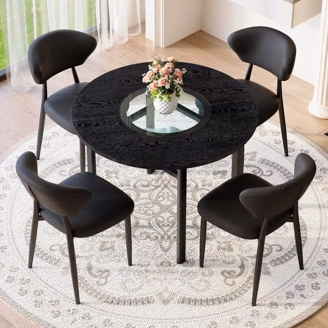 Set da pranzo Mivray moderno con tavolo rotondo e 4 sedie in nero, realizzato in MDF, vetro e metallo, Diametro: 100 cm