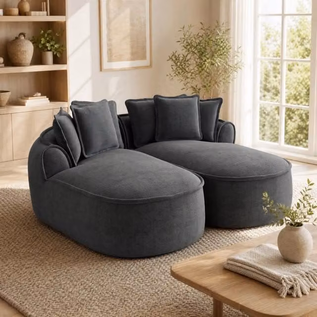 Divano modulare grigio in ciniglia; 2 moduli con funzione letto